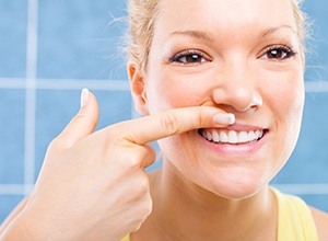 Woman looking at gum tissue