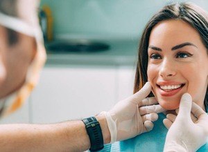 Woman receiving physical exam