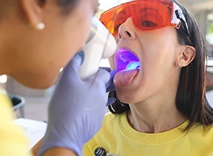 Patient receiving oral cancer screening