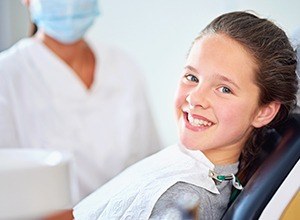 Young girl in dental chair