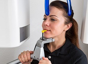 Woman receiving CT cone beam scans